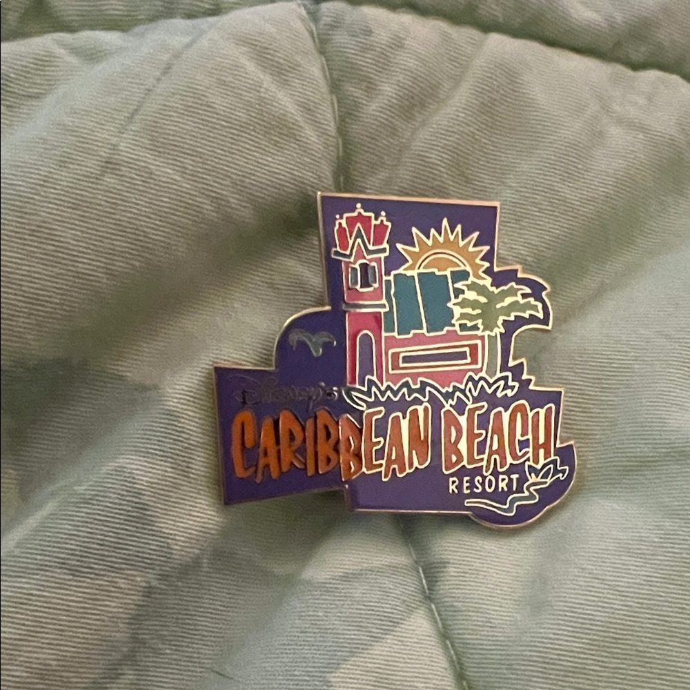 Disney  limited edition Caribbean Beach Resort Pin with Blue and Green